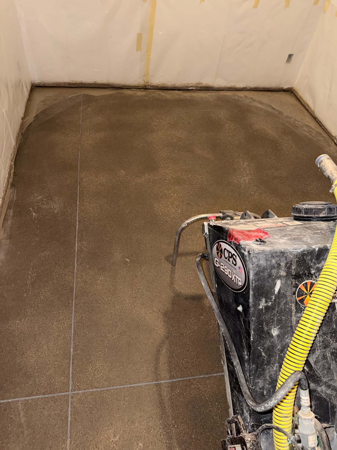 Concrete polishing equipment on a floor being finished in Des Moines